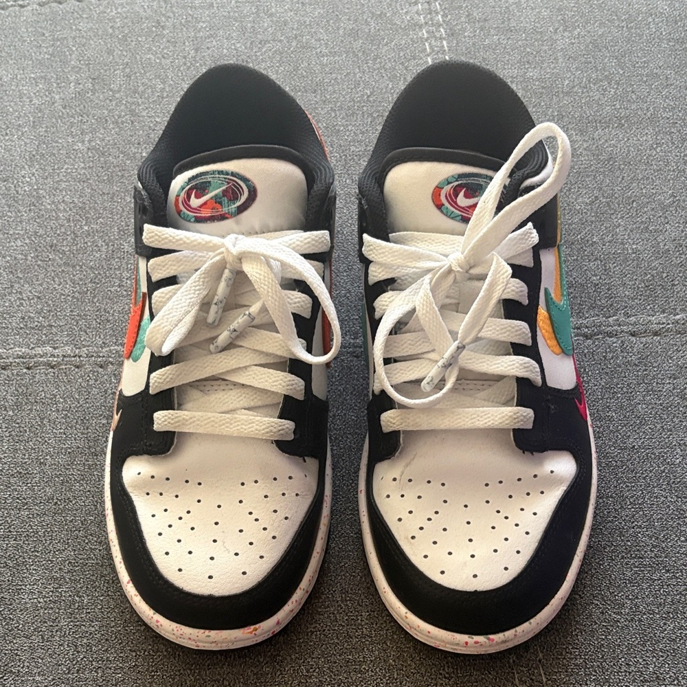 Nike Black and White Sneakers with Orange and Teal Accents